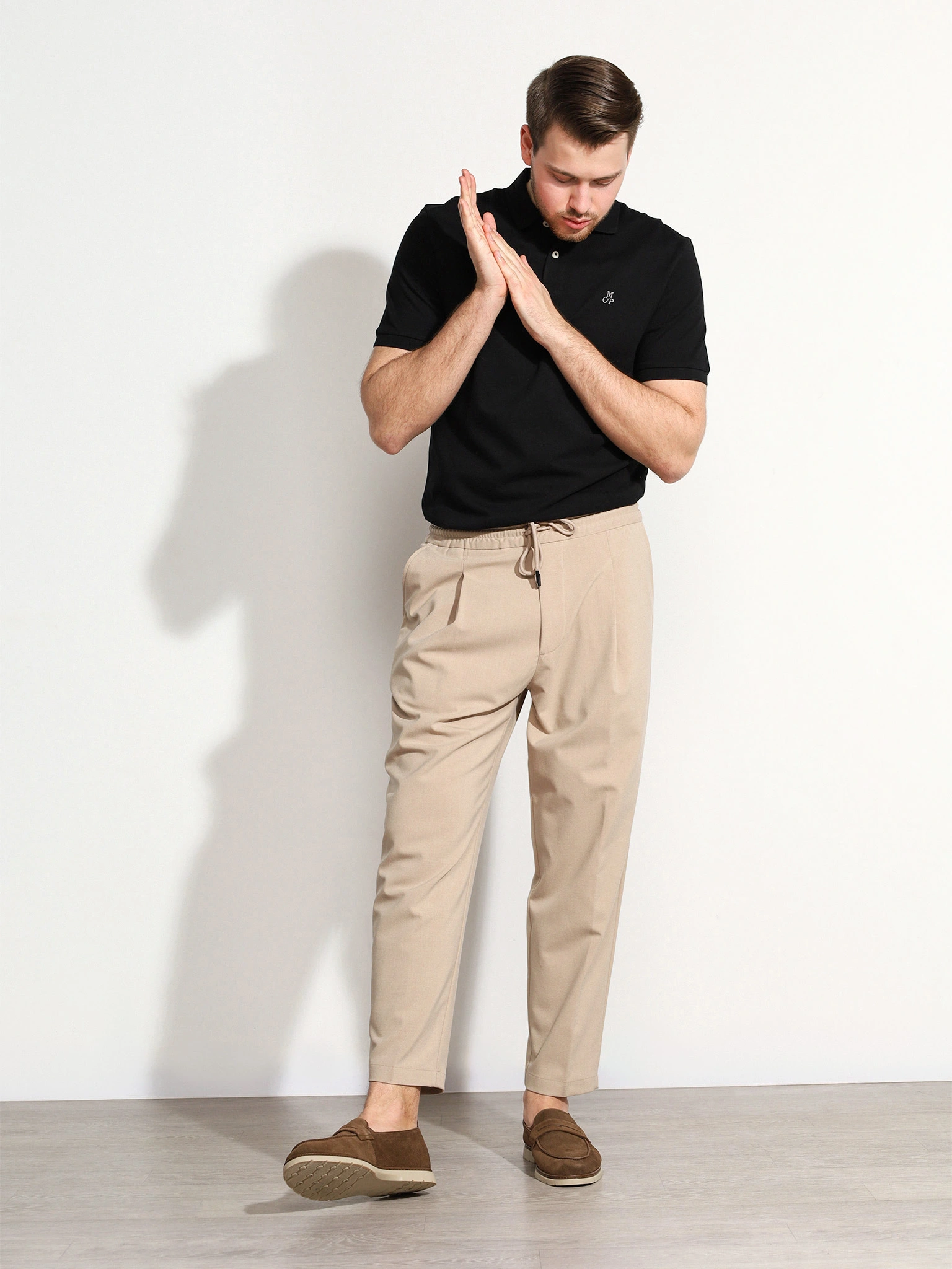 Поло черного цвета из хлопка